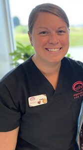 VPFW provider medical assistant nurse in black scrubs smiling