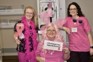 VPFW mammography team with mammogram machine offering free mammograms for low income women